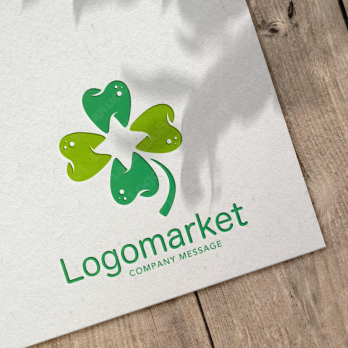 歯科と四つ葉と安心感のロゴ