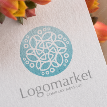 エンブレムとヒーリングとナチュラルのロゴ