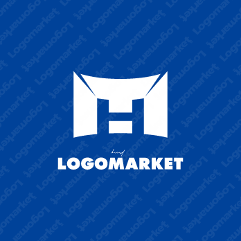 建物と総合力とT・H・Mのロゴ