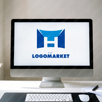 建物と総合力とT・H・Mのロゴ