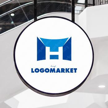 建物と総合力とT・H・Mのロゴ