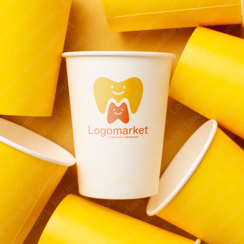 歯と親しみやすいとMのロゴ