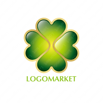 四つ葉のクローバーと宝石とジュエリーのロゴ