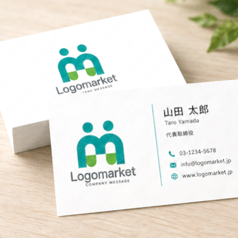 Mと薬と人のロゴ