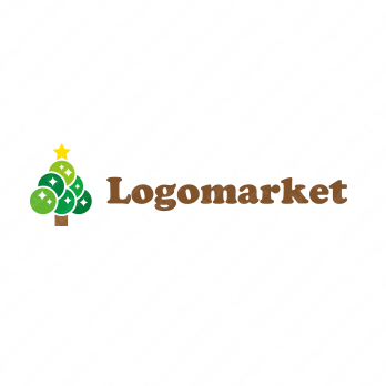 木とクリスマスとパーティーのロゴ