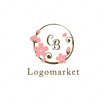 桜と枝とフレームのロゴ